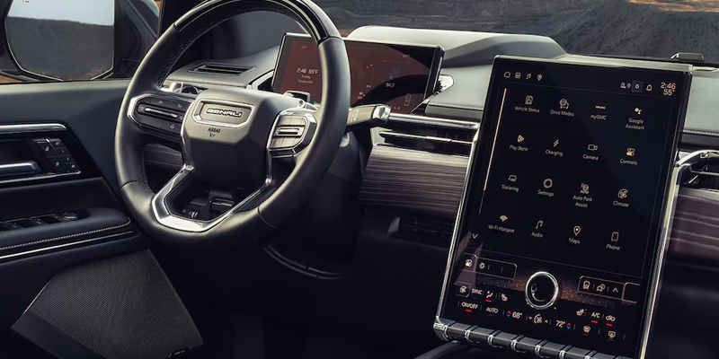 Technology features of the 2026 GMC Sierra EV Elevation Extended Range showcasing the large touchscreen infotainment system